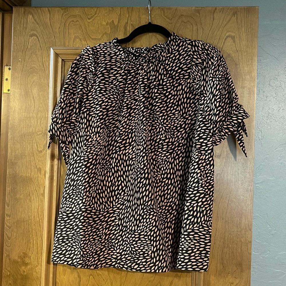 Black and pink ruffle top